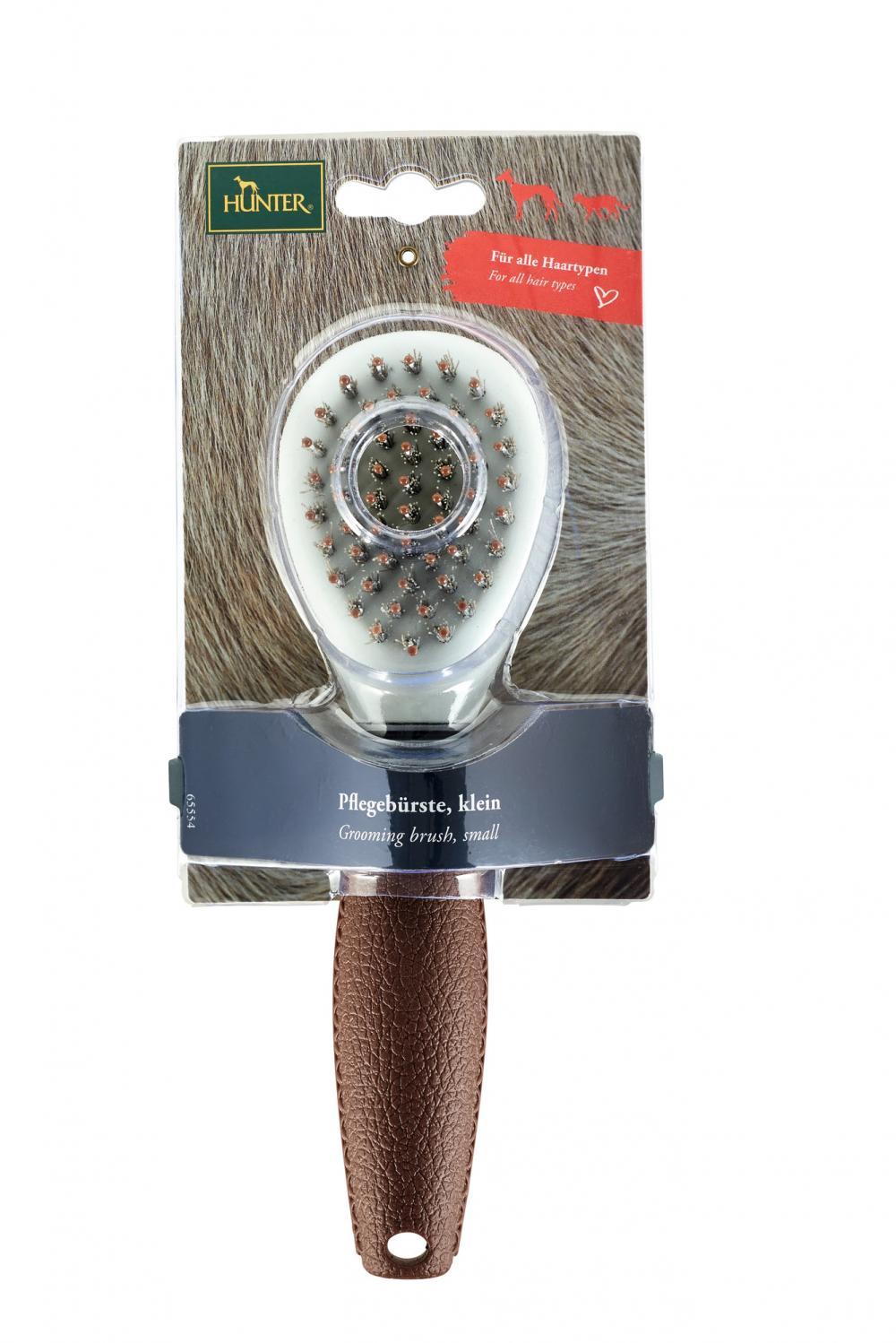 Kompakte HUNTER Pflegebürste Spa klein in Verkaufsverpackung, ideal für kleine Hunde und empfindliche Fellbereiche. Für alle Haartypen geeignet.