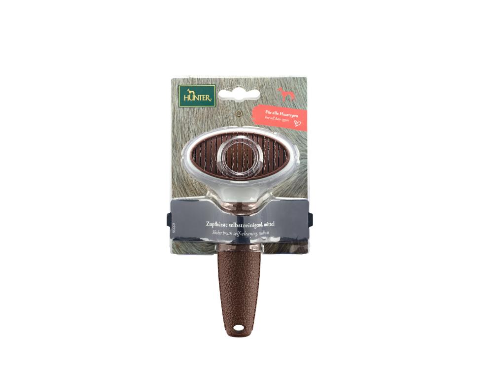 HUNTER Zupfbürste Spa selbstreinigend in Originalverpackung, ideal für den Verkauf im Tierbedarf mit klarer Produktpräsentation.