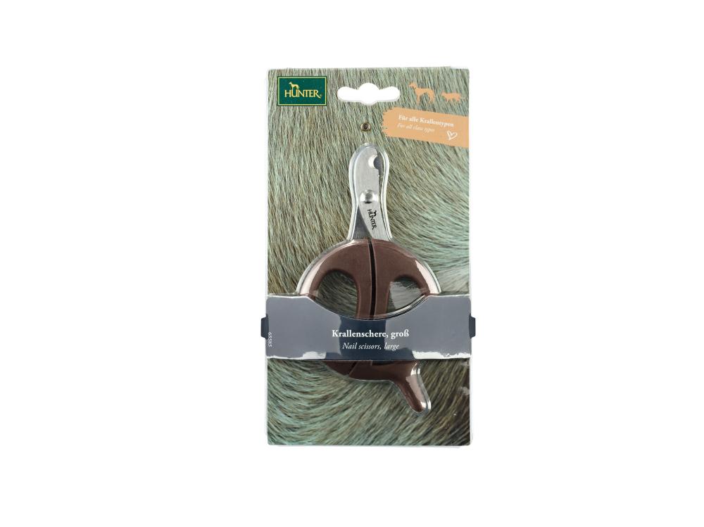 Verpackte HUNTER Krallenschere Spa groß für Hunde, präsentiert auf Fellhintergrund. Perfekt für professionelle Krallenpflege zu Hause.